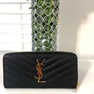 Beautiful black authentic YSL wallet zip around wallet